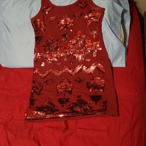 Red seqin pattern tight fitting dress.